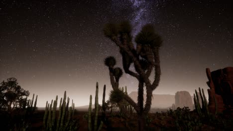 hiperlapso en el parque nacional del valle de la muerte desierto iluminado por la luna bajo las estrellas de la galaxia