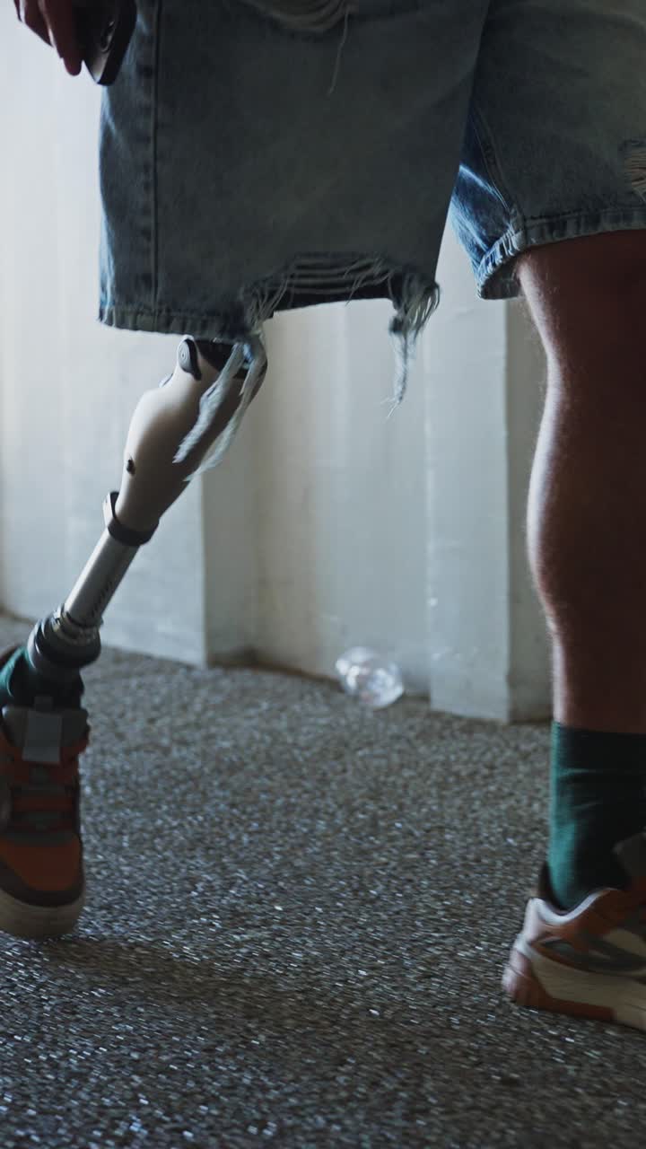 Person with prosthetic leg walking