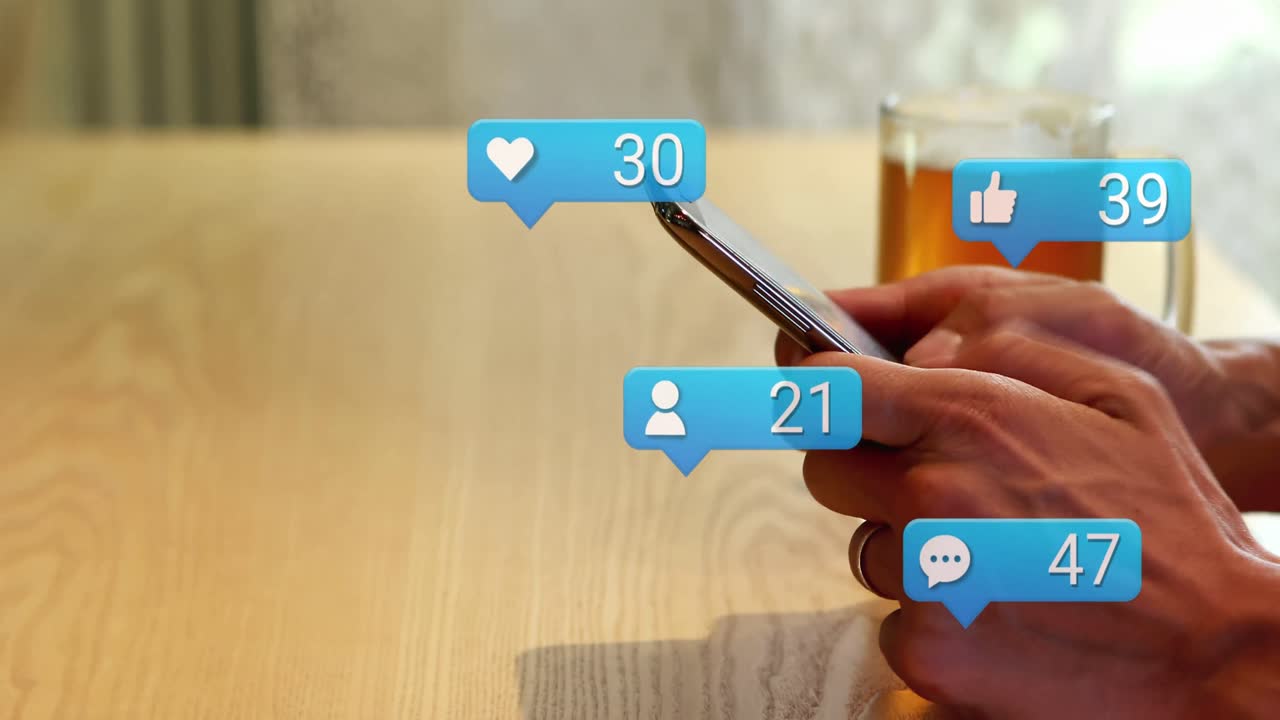 Animation of social media icons falling over person using smartphone