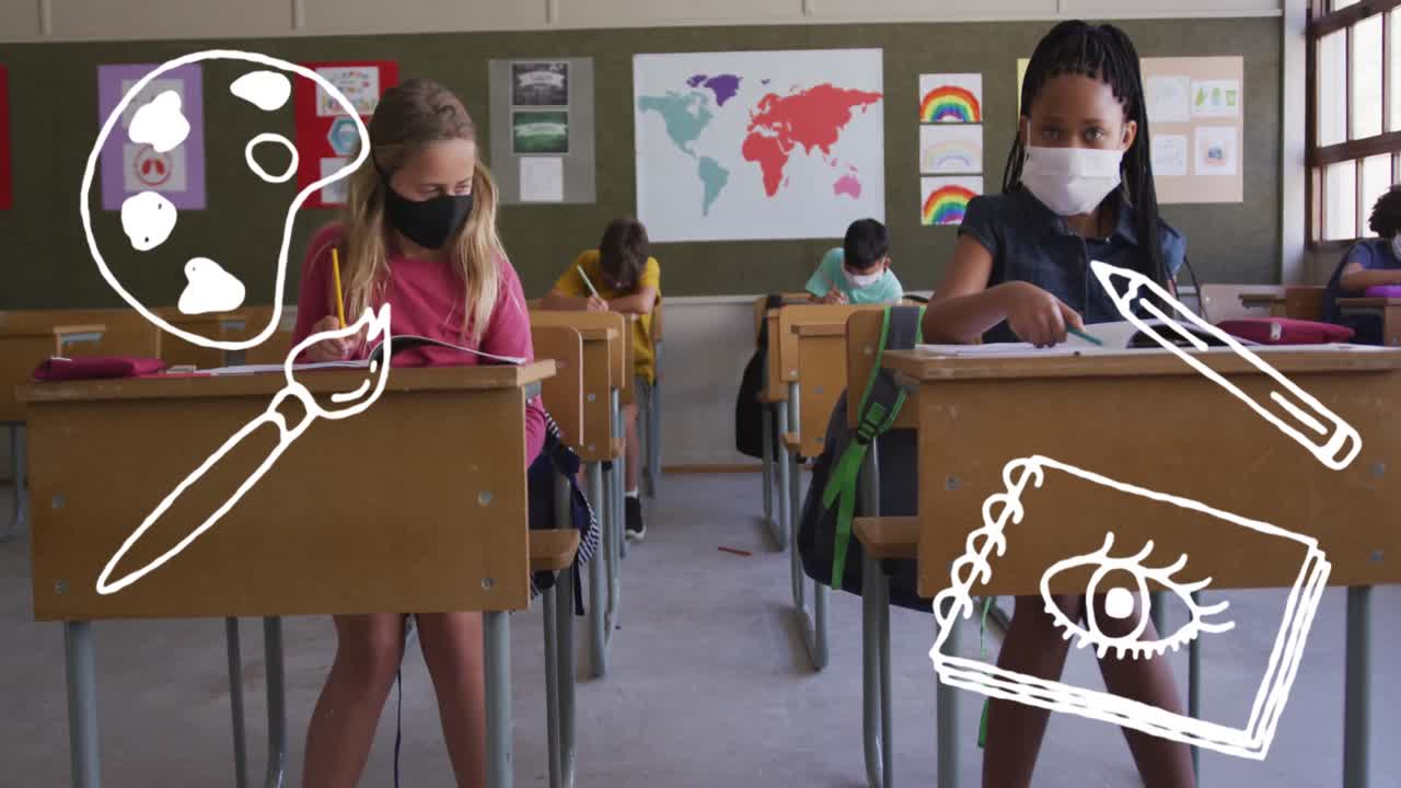 School concept icons against two diverse girl wearing face mask studying at elementary school