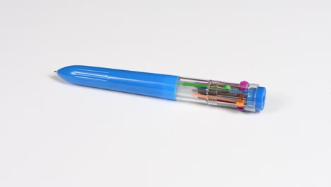 pen with colored refills on a white. ten different colors. side view. loop motion. rotation 360.