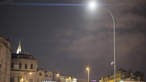 night view of city street with lamppost