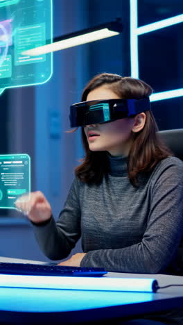 woman working with virtual reality technology in a futuristic office