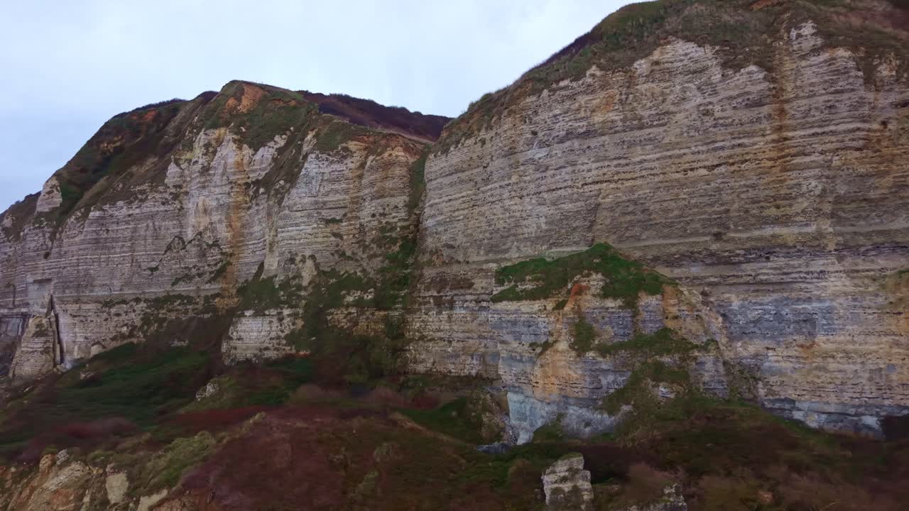 Drone flying along the impressive chalk cliffs of the Alabaster Coast, Côte d'Albâtre at Saint-Jouin-Bruneval, Normandy, France. Aerial