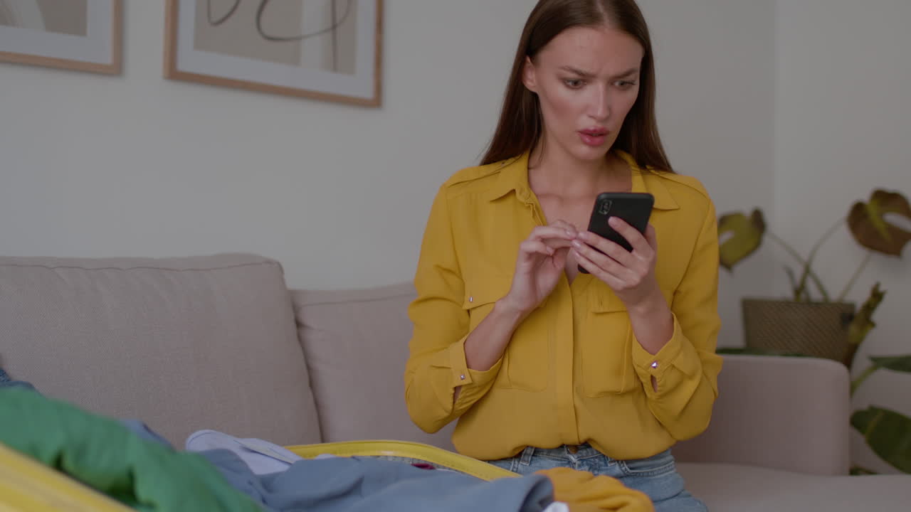 Woman frustrated with packing