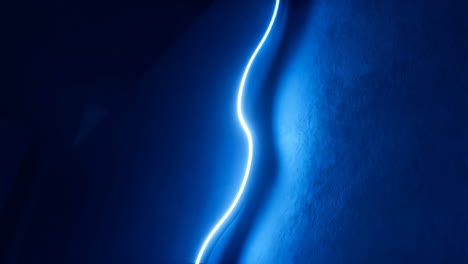 abstract blue neon light curve on dark background