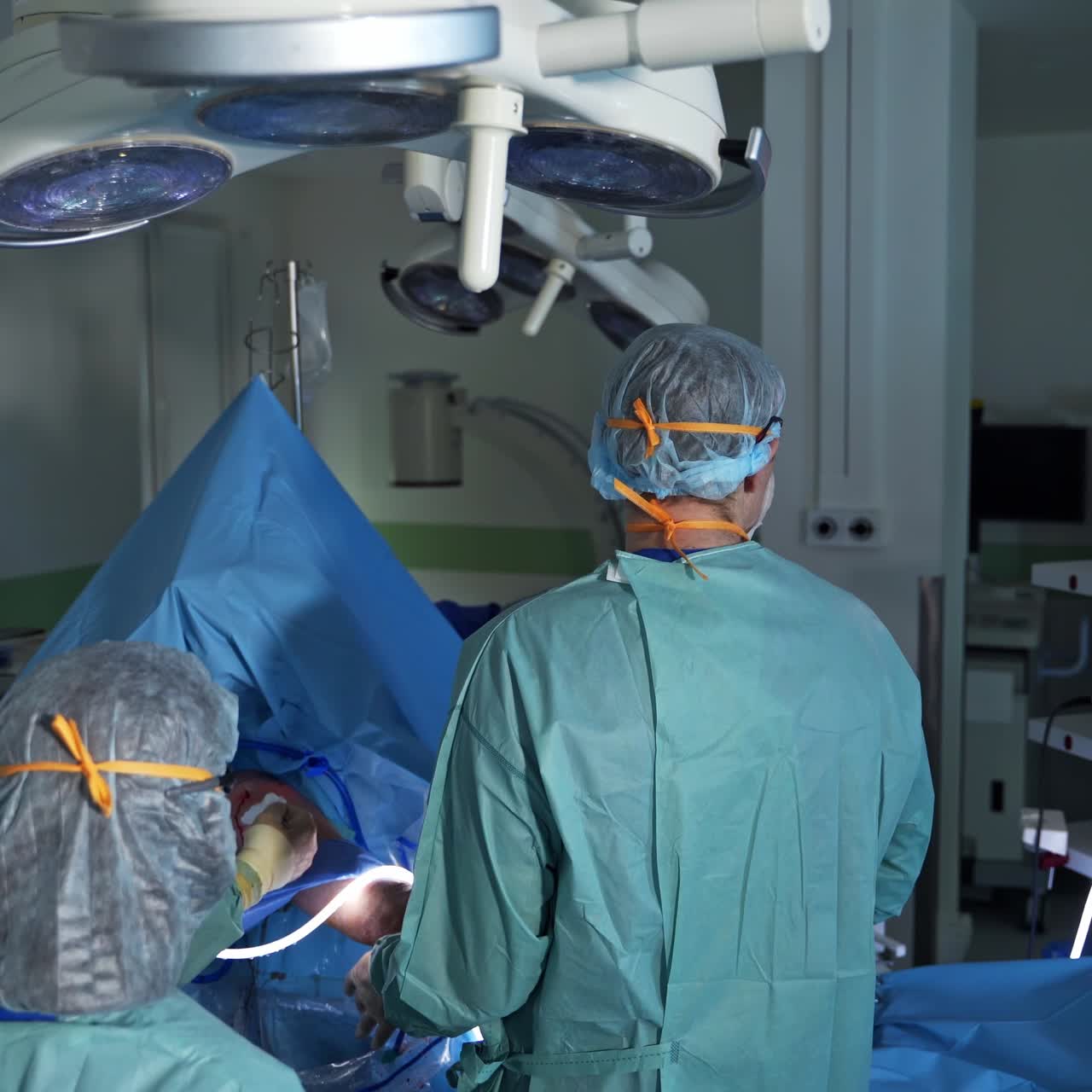 Medical specilaists in teamwork. Surgeon professional doctors working in emergency hospital room