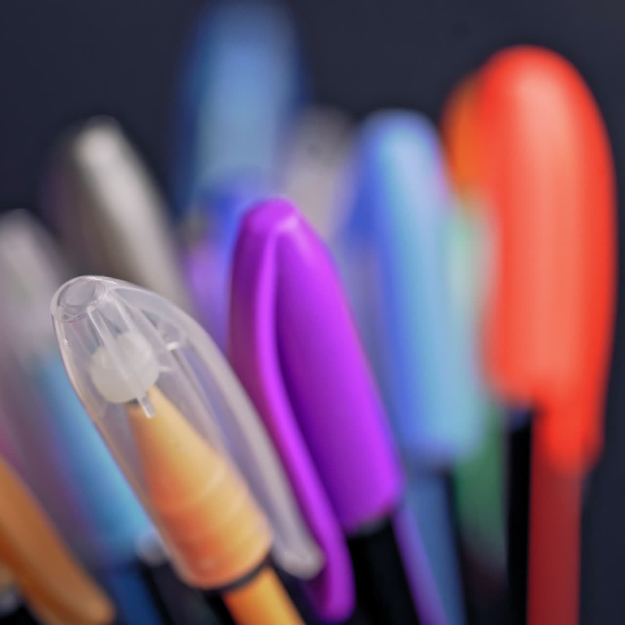 a set of colored pens rotates. Art and creativity.