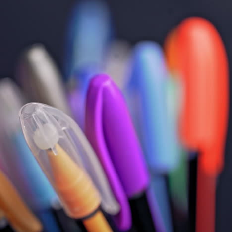 a set of colored pens rotates. art and creativity.