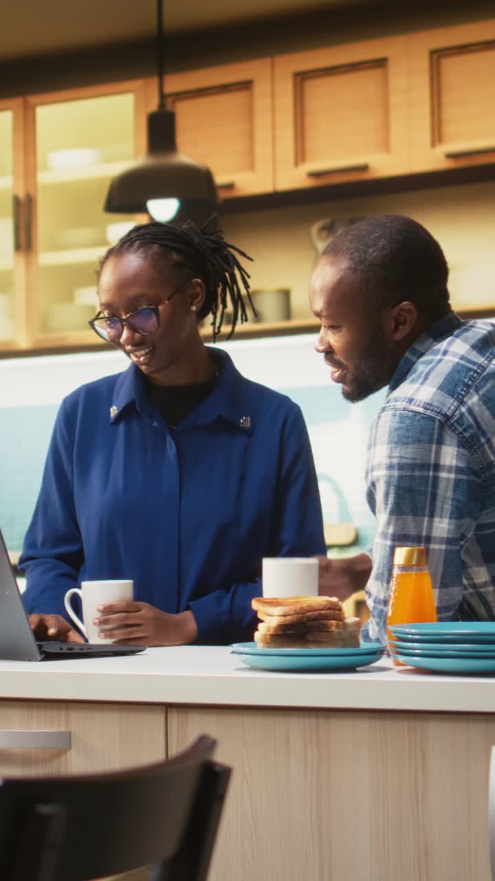 Vertical Video Black boyfriend and girlfriend making a delicious breakfast meal
