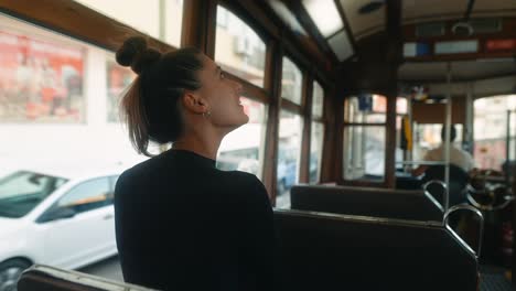 woman riding a tram