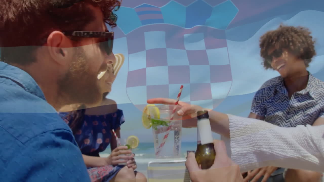 Animation of flag of croatia over diverse friends drinking cocktails and beers on sunny beach