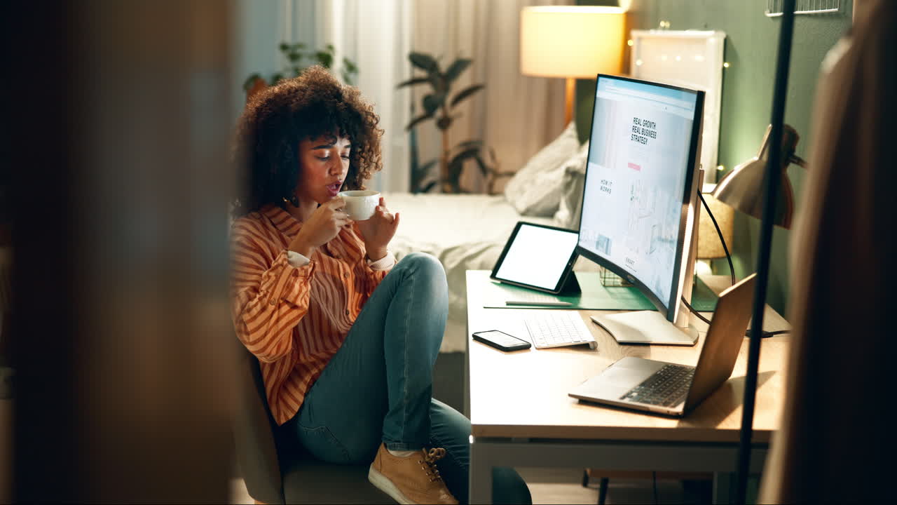 Woman working from home in a cozy bedroom