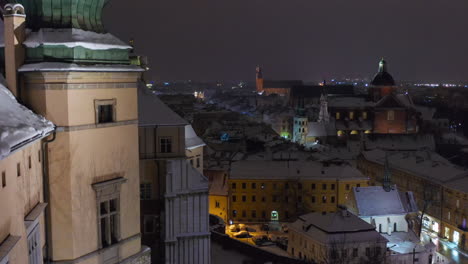 Winter-in-Krakow,-Poland---Aerial-view-of-Downtown,-Main-Market-Square,-Sukiennice,-St