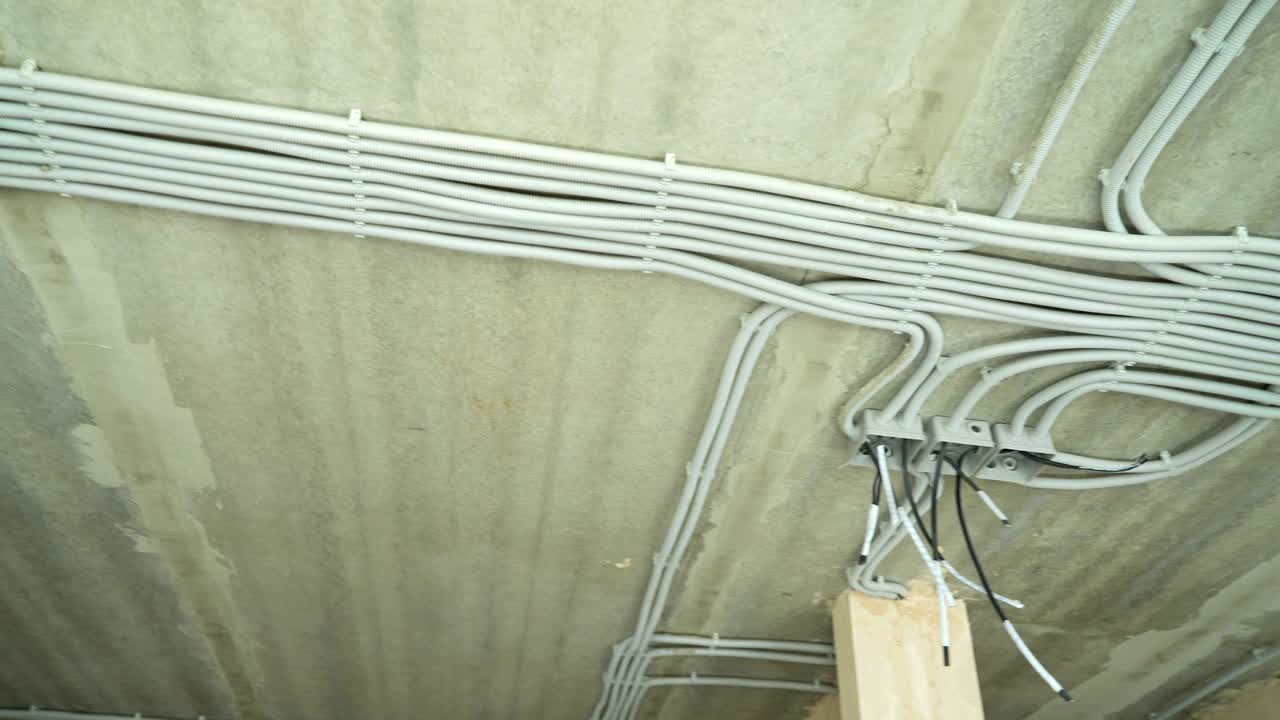 Electrical installation of plastic electrification tubes on building site