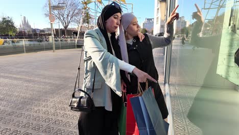 women in hijabs shopping in the city