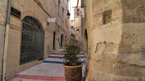 beautiful street in montpellier with colorful steps france