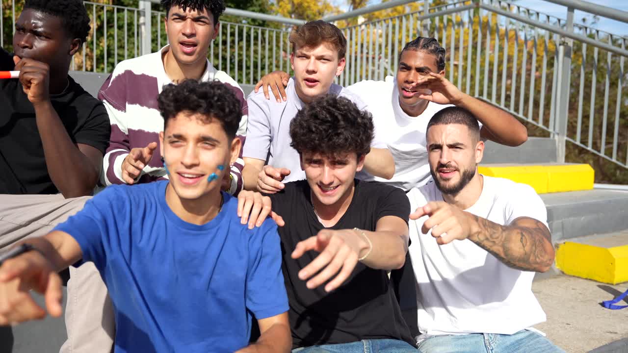 Enthusiastic Group of Fans Cheering and Celebrating