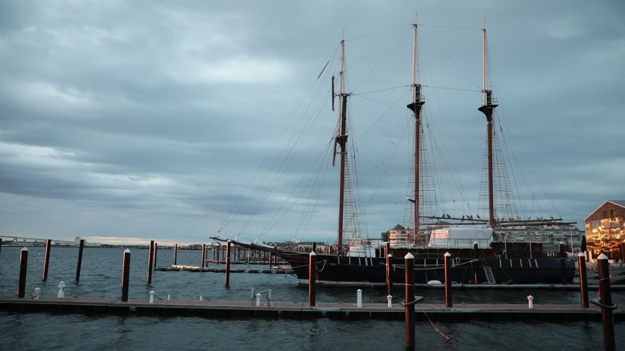 Ship at port during a storm at sunset
