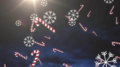 Animation-of-candy-canes,-snowflakes-and-fireworks-over-dark-background