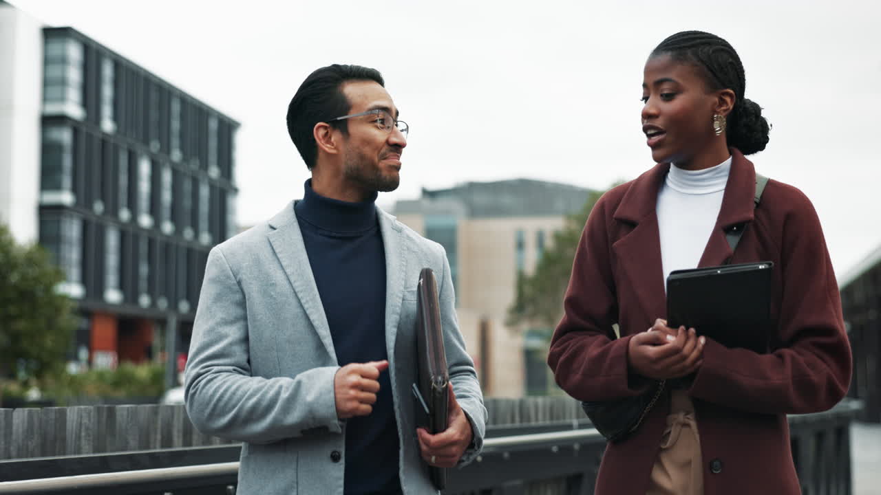 Business People Talking and Walking in the City
