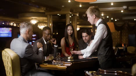 People-playing-poker-at-the-casino.