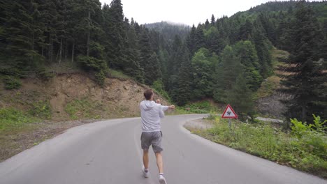 sportsman jogging in the forest.