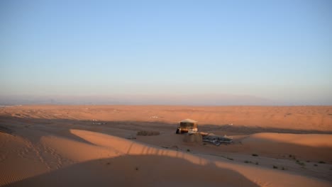 view of a tourist tent camp in wahiba sands, desert in oman