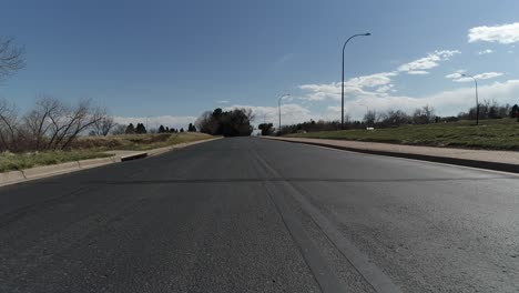 a drone pan along a street