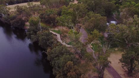 Aerial-tilt-down-view-over-the-Swan-Valley-Perth-with-cycle-path-and-boardwalk-near-riverside