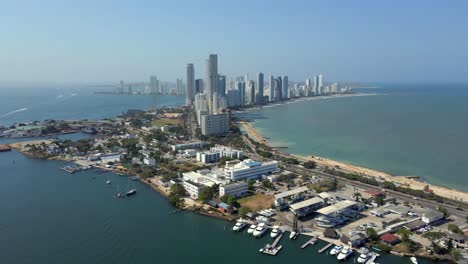 cartagena bocagrande colombia caribbean sea coastline aerial drone city modern buildings beach town latino