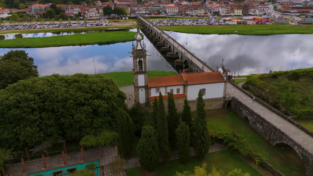 Charming church and Roman bridge over Lima River in Ponte de Lima, Portugal