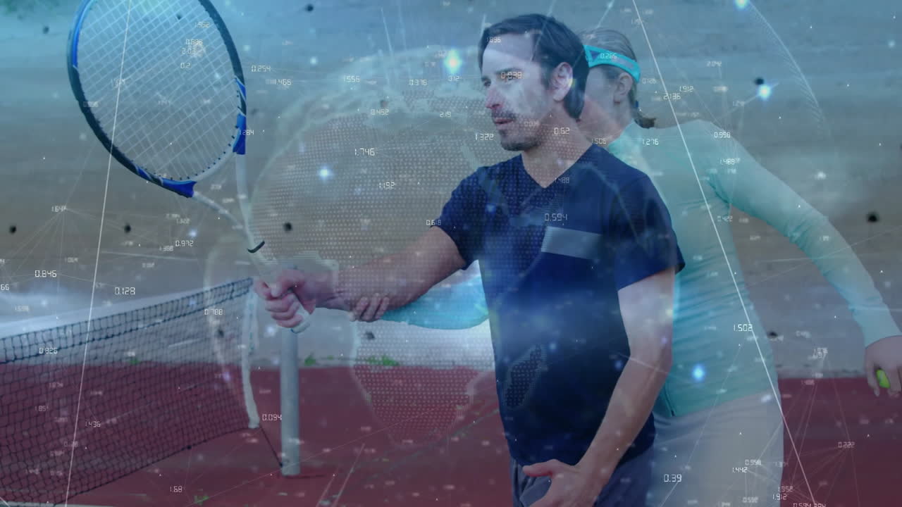 male coach guiding female trainee grip on clay court, displaying tennis data overlay