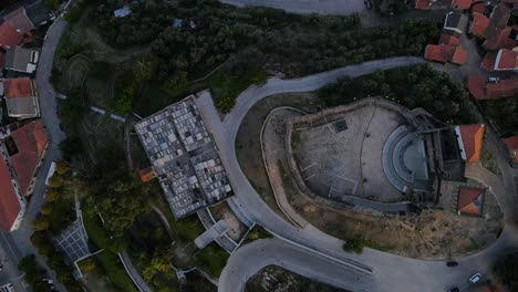 A-drone-pans-over-in-a-satellite-birds-eye-view-of-Belmont-Castle-showing-the-nearby-town