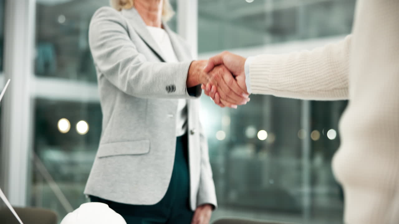 Un apretón de manos de negocios.