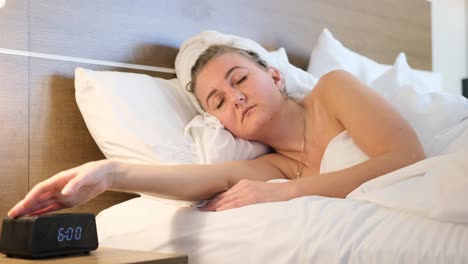 woman waking up in bed