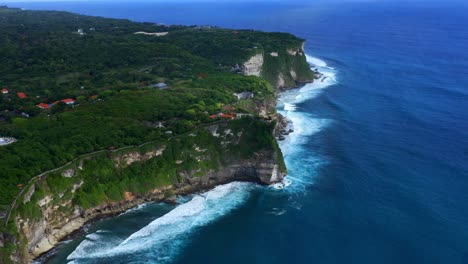 Scenic-Uluwatu-Ocean-Cliffs-In-Bali,-Indonesia---aerial-shot