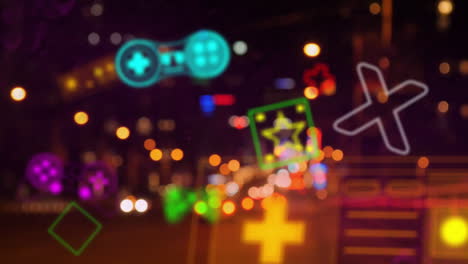 Neon-gaming-icons-animation-over-blurred-city-lights-at-night