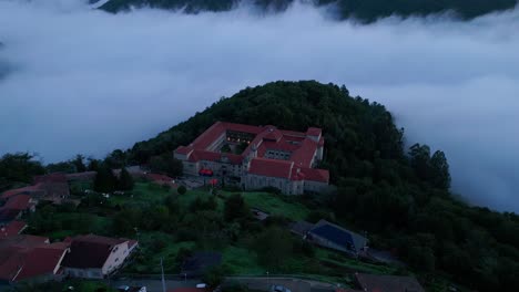 aerial view of foggy sil canyon and santo estevo monsatery, luintra, spain