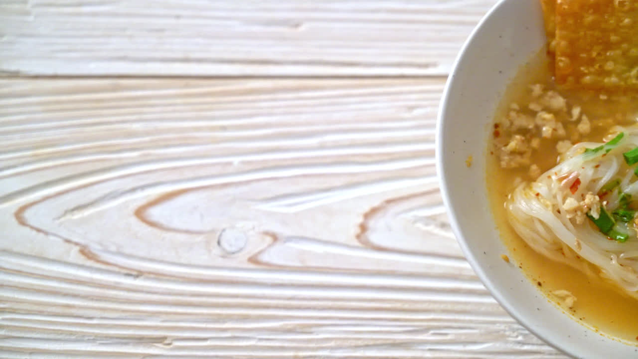 spicy noodles with fish ball and minced pork (Tom Yum Noodles) - Asian food style