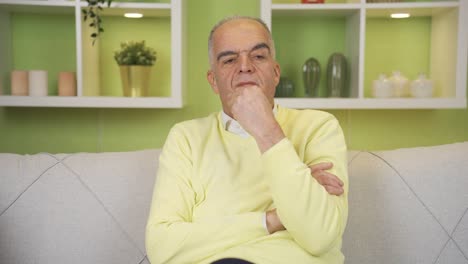 Close-up-portrait-of-thoughtful-old-man.