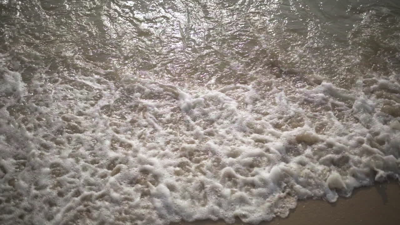 Slow Motion . Waves at sunset, Ocean Beach in pattaya Thailand .