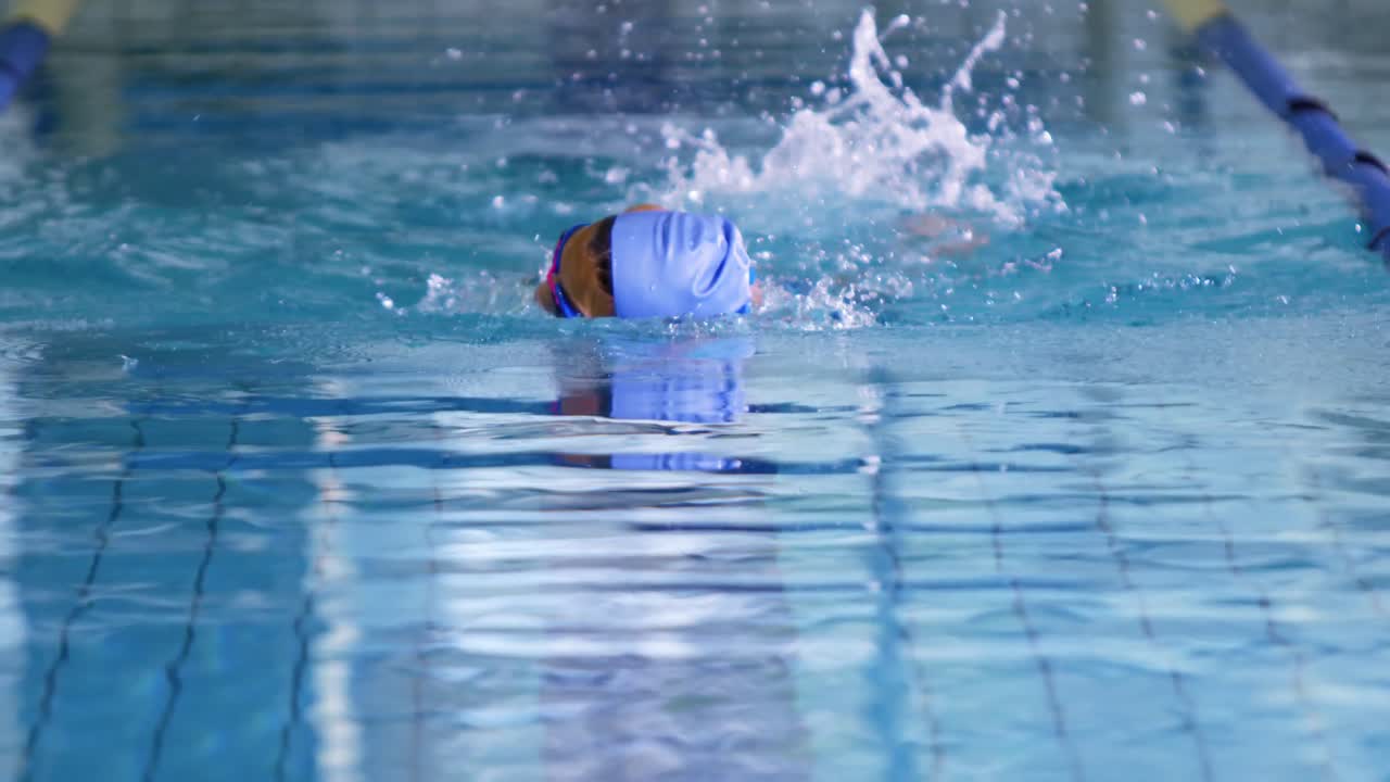 Swimmer training in a swimming pool