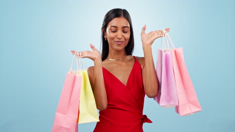 happy dance, woman or shopping bag in studio