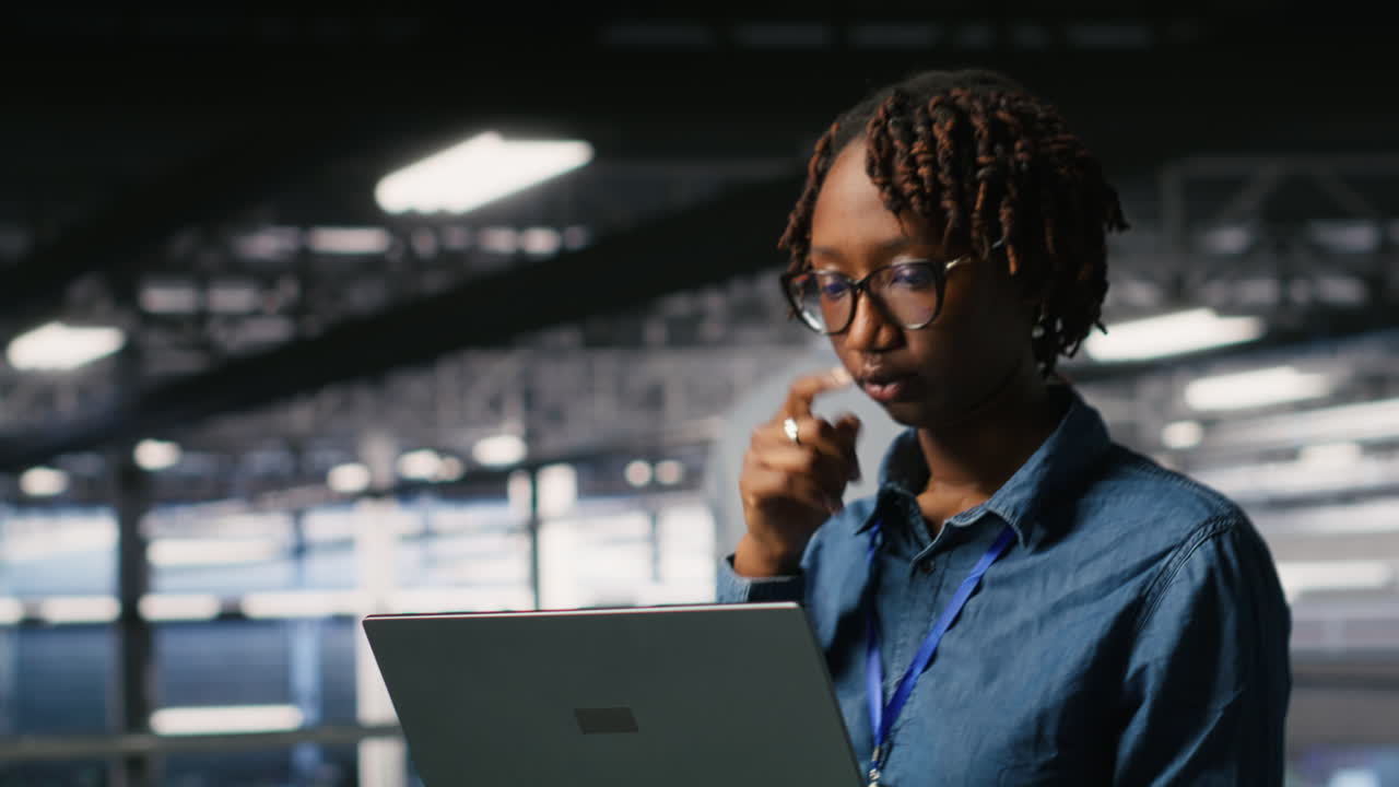 System administrators on data center platform analyzing performance outputs