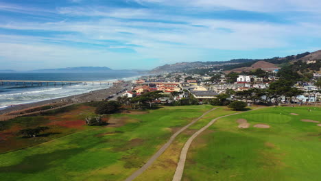 aerial view approaching the city of pacifica, golden hour in california, usa