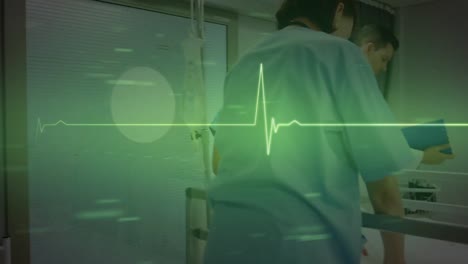 animation of heart rate monitor over female health workers and asian boy at hospital