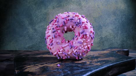 Donat-close-up-on-vintage-old-wooden-table