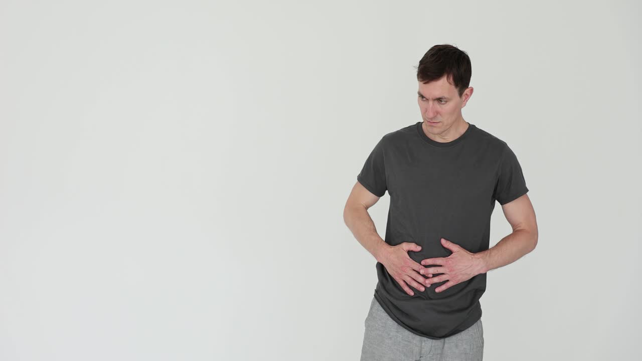 Man experiencing abdominal pain
