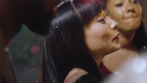 Close-Up-Shot-of-Group-of-Friends-Singing-In-Karaoke-Bar